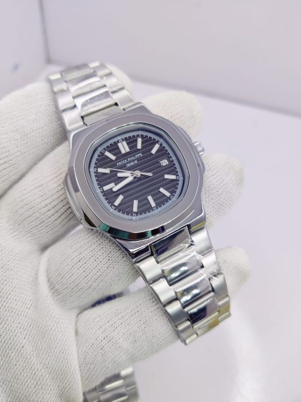 Patek Philipe Geneve chain date watch
